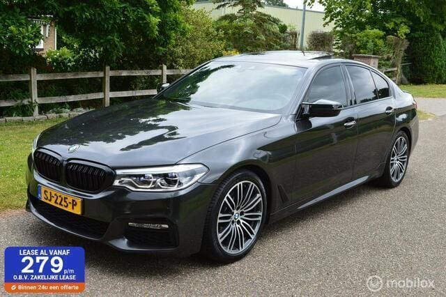 Grijs Gebruikt 2018 BMW 520 M Sport Sedan | € 20.850 (Eerlijke prijs) - Afbeelding 1/4