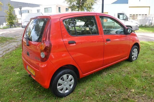 Occasion Daihatsu Cuore 69 PK (50 kW) 2008 Rood Hatchback