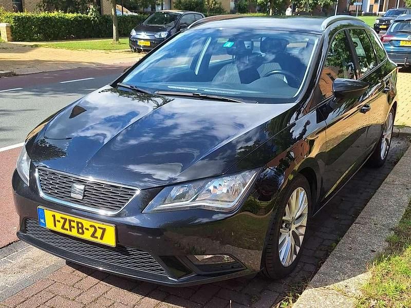 Zwart Gebruikt 2014 Seat Leon Stationwagen | € 5.499 (Duur) - Afbeelding 1/4