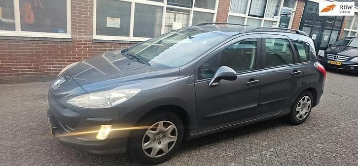 Grijs Gebruikt 2010 Peugeot 308 SW Stationwagen | € 500 (Super prijs) - Afbeelding 1/4