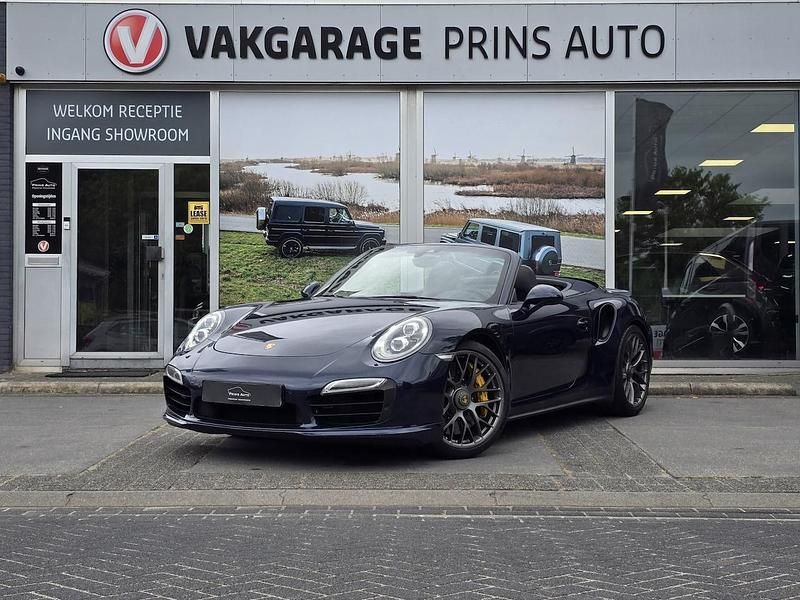 Blauw (metallic) Gebruikt 2014 Porsche 911 Turbo S Cabriolet Cabriolet | € 108.911 - Afbeelding 1/4