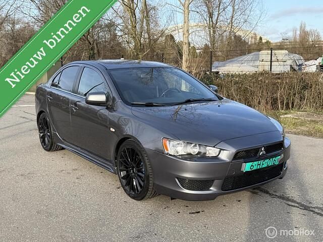 Grijs Occasion 2008 Mitsubishi Lancer Inform Sedan | € 6.995 (Super prijs) - Afbeelding 1/4