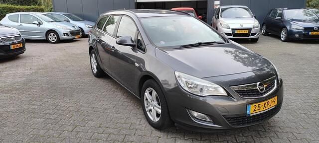 Occasion Opel Astra Business 101 PK (74 kW) 2012 Grijs (metallic) Stationwagen