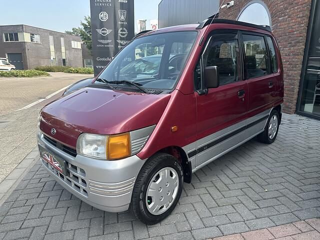 Rood Gebruikt 1997 Daihatsu Move Hatchback | € 1.245 - Afbeelding 1/4