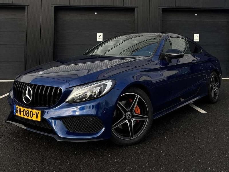 Blauw Occasion 2017 Mercedes C220 Premium Plus Coupé | € 21.500 (Eerlijke prijs) - Afbeelding 1/4