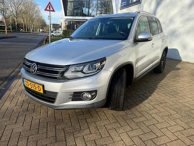 Grijs Occasion 2011 VW Tiguan Sport SUV | € 7.999 (Goede deal) - Afbeelding 1/4