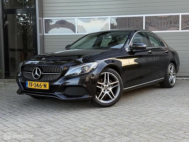 Zwart Gebruikt 2017 Mercedes C180 Premium Plus Sedan | € 16.450 (Goede deal) - Afbeelding 1/4