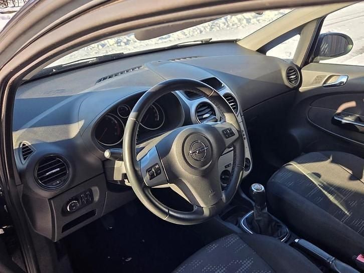 Occasion Opel Corsa 87 PK (63 kW) 2011 Zwart Hatchback