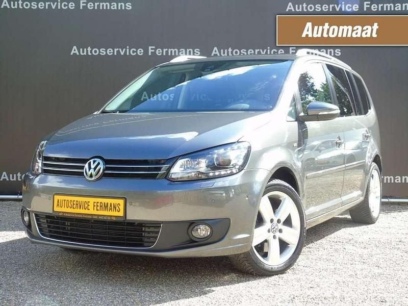 Grijs, metallic lak Gebruikt 2014 VW Touran MPV | € 14.950 (Duur) - Afbeelding 1/4