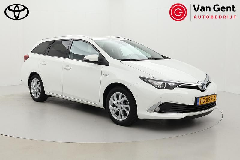 Wit Gebruikt 2015 Toyota Auris Touring Sports Executive Stationwagen | € 14.999 (Iets duurder) - Afbeelding 1/4