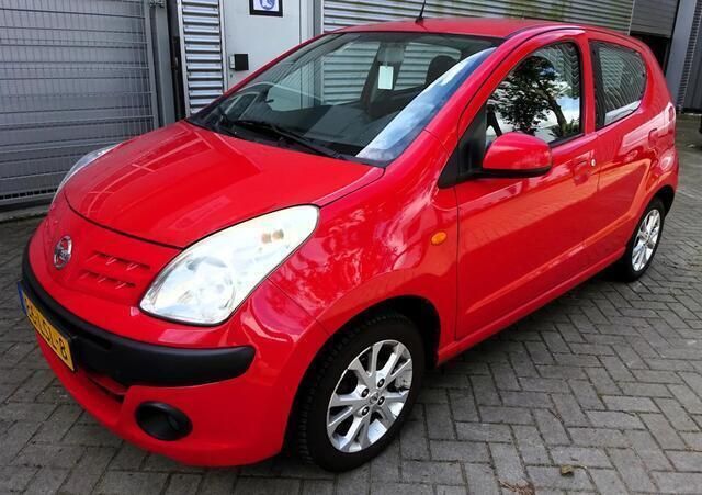 Rood Gebruikt 2010 Nissan Pixo Acenta Hatchback | € 3.995 (Iets duurder) - Afbeelding 1/4