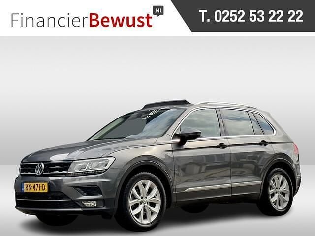Grijs Gebruikt 2018 VW Tiguan Highline SUV | € 17.900 (Goede deal) - Afbeelding 1/4