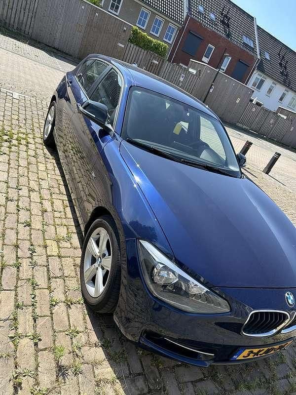 Blauw Gebruikt 2013 BMW 116 Sport Line Hatchback | € 10.250 (Eerlijke prijs) - Afbeelding 1/4