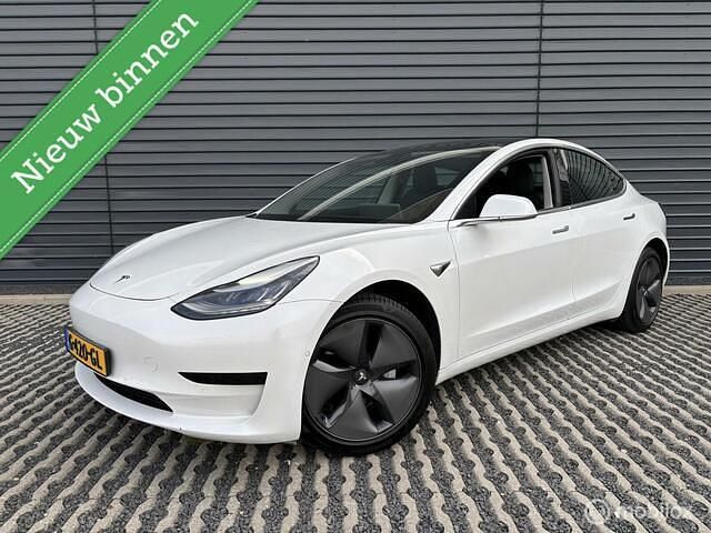 Wit, metallic lak Gebruikt 2019 Tesla Model 3 Standard Range Sedan | € 16.995 (Eerlijke prijs) - Afbeelding 1/4