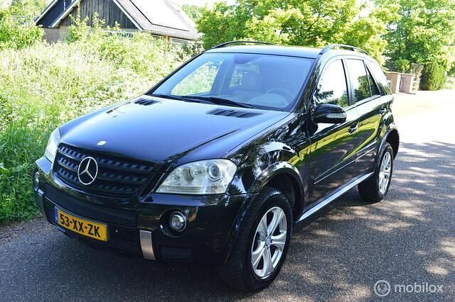 Zwart Occasion 2007 Mercedes 280 AMG SUV | € 6.599 (Goede deal) - Afbeelding 1/4