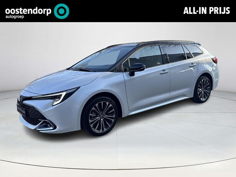 Wit Nieuw 2024 Toyota Corolla Hybrid Plus Stationwagen | € 37.949 - Afbeelding 1/4