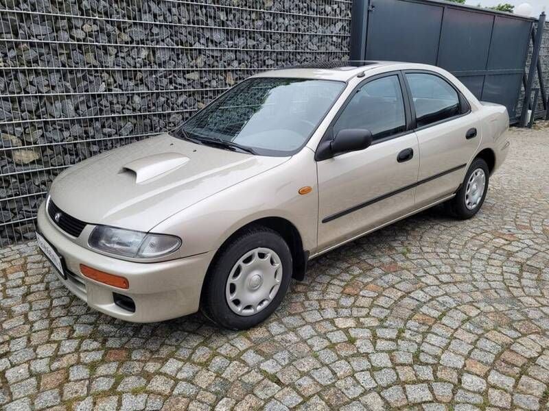 Goud Gebruikt 1995 Mazda 323S Sedan | € 15.000 - Afbeelding 1/4