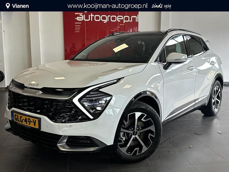 Deluxe white m Gebruikt 2024 Kia Sportage SUV | € 41.950 (Eerlijke prijs) - Afbeelding 1/4