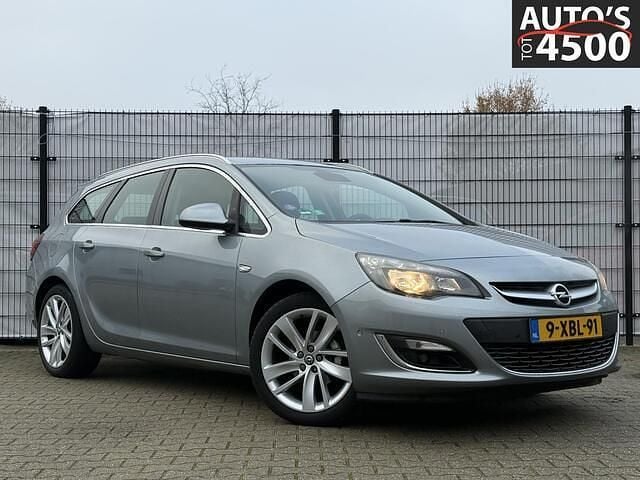 Grijs Gebruikt 2014 Opel Astra Sport Stationwagen | € 4.950 (Eerlijke prijs) - Afbeelding 1/4