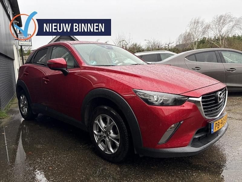 Rood (metallic) Gebruikt 2017 Mazda CX-3 Dynamic SUV | € 16.750 (Eerlijke prijs) - Afbeelding 1/4