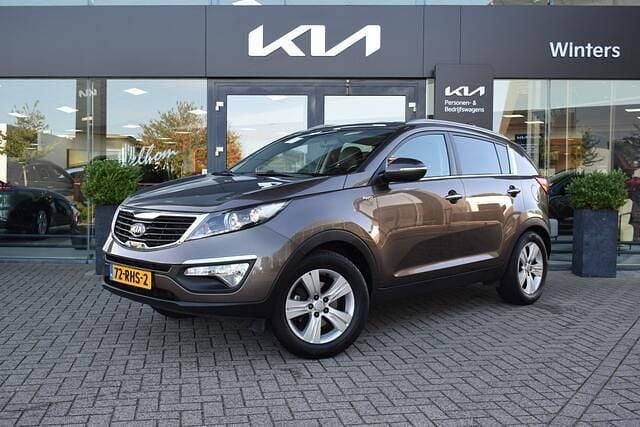 Bruin Gebruikt 2011 Kia Sportage Plus SUV | € 9.755 (Eerlijke prijs) - Afbeelding 1/4