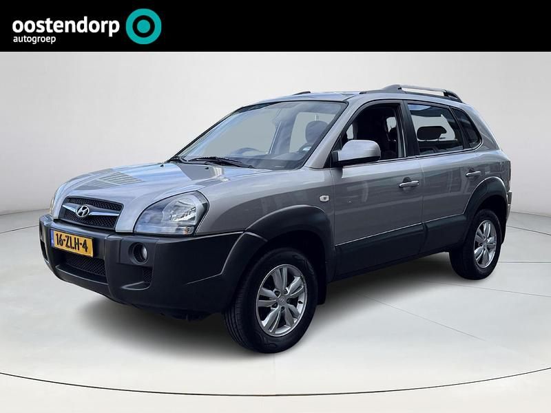 Grijs Gebruikt 2009 Hyundai Tucson Dynamiq SUV | € 3.740 (Eerlijke prijs) - Afbeelding 1/4