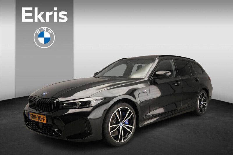 Zwart Gebruikt 2024 BMW 320e M Sport Stationwagen | € 68.900 - Afbeelding 1/4