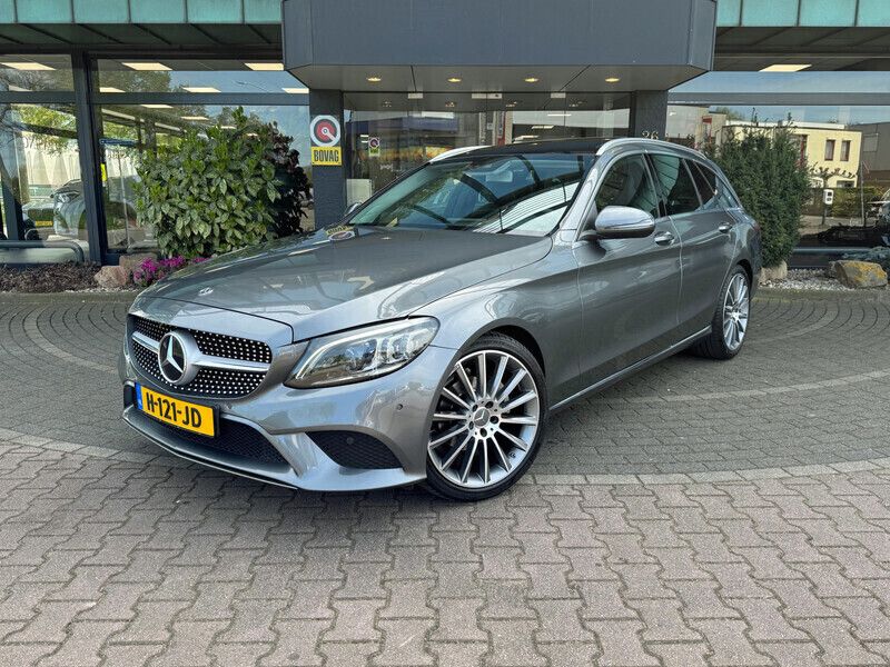 Grijs Gebruikt 2019 Mercedes C180 AMG Stationwagen | € 28.950 (Duur) - Afbeelding 1/4