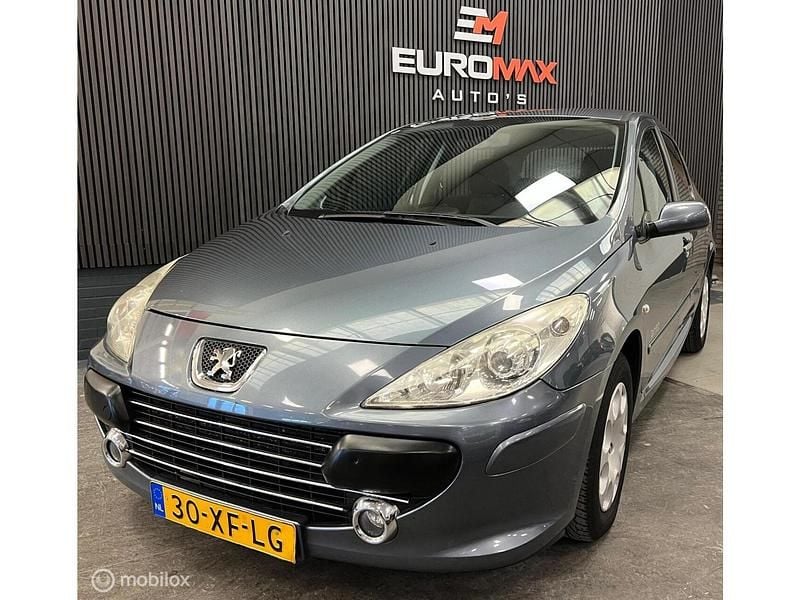 Grijs Gebruikt 2007 Peugeot 307 Premium Hatchback | € 1.999 (Eerlijke prijs) - Afbeelding 1/4