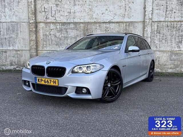 Grijs Gebruikt 2016 BMW 520 M Sport Stationwagen | € 19.950 - Afbeelding 1/4