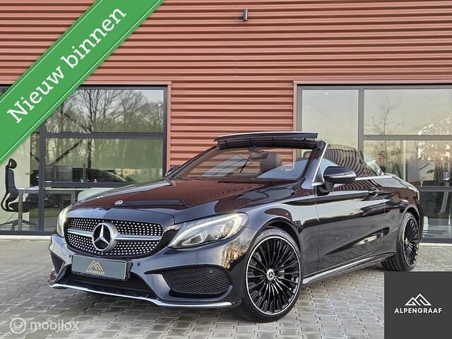 Zwart Occasion 2018 Mercedes C180 AMG line Cabriolet | € 25.990 (Eerlijke prijs) - Afbeelding 1/4