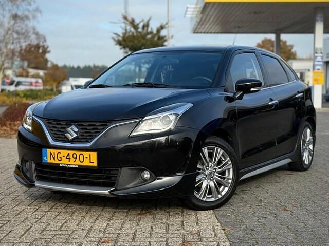 Zwart (metallic) Gebruikt 2017 Suzuki Baleno Hatchback | € 9.900 - Afbeelding 1/4