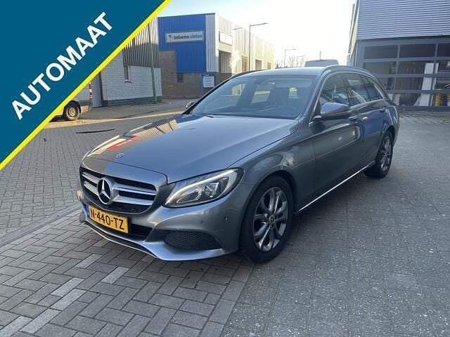 Grijs Occasion 2017 Mercedes C180 Premium Plus Stationwagen | € 9.999 (Super prijs) - Afbeelding 1/4