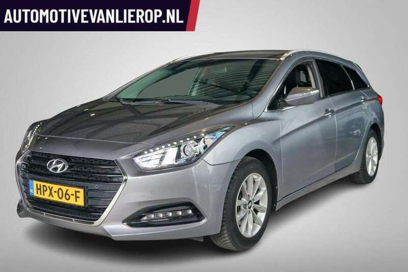 Grijs, metallic lak Gebruikt 2016 Hyundai i40 Stationwagen | € 14.995 - Afbeelding 1/4