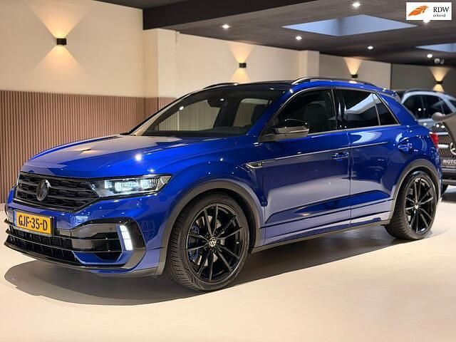 Blauw (metallic) Gebruikt 2021 VW T-Roc Beats SUV | € 34.950 (Super prijs) - Afbeelding 1/4
