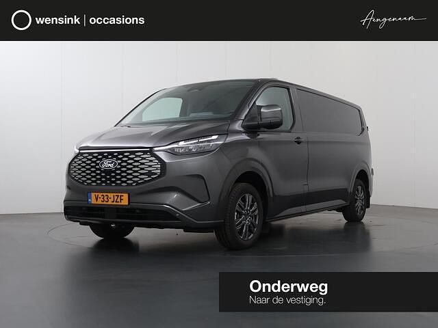 Grijs Gebruikt 2024 Ford E-Transit Limited Van | € 38.850 (Super prijs) - Afbeelding 1/4