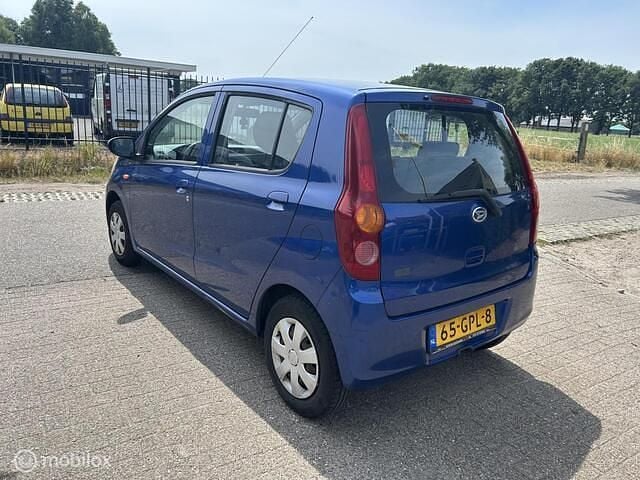 Occasion Daihatsu Cuore 69 PK (50 kW) 2008 Blauw Hatchback