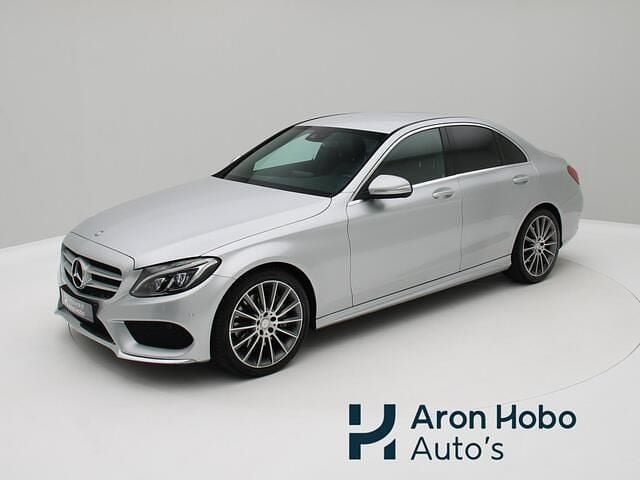 Grijs (metallic) Gebruikt 2015 Mercedes C250 AMG Sedan | € 22.950 (Eerlijke prijs) - Afbeelding 1/4