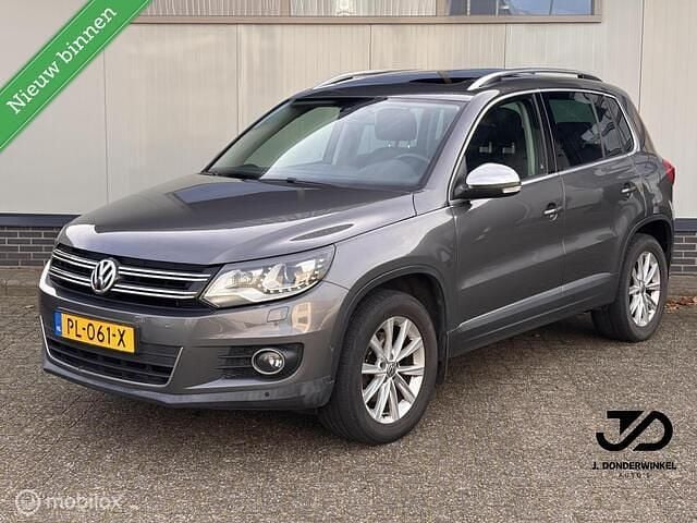 Grijs Gebruikt 2014 VW Tiguan SUV | € 11.750 (Goede deal) - Afbeelding 1/4