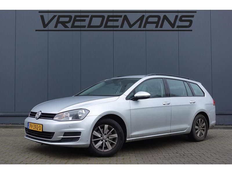 Grijs (metallic) Gebruikt 2014 VW Golf VII Highline Stationwagen | € 4.950 (Eerlijke prijs) - Afbeelding 1/4