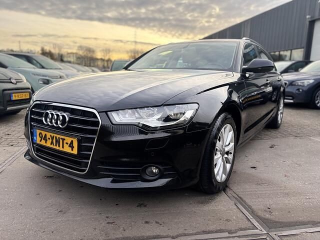 Bruin (metallic) Occasion 2012 Audi A6 Business Stationwagen | € 8.950 (Goede deal) - Afbeelding 1/4