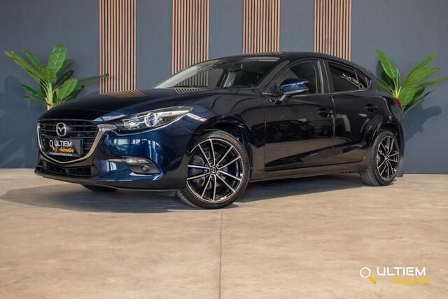 Blauw, metallic lak Gebruikt 2018 Mazda 3 Hatchback | € 16.990 (Eerlijke prijs) - Afbeelding 1/4