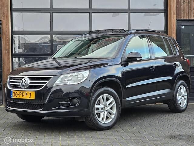 Zwart (metallic) Gebruikt 2011 VW Tiguan SUV | € 5.750 (Goede deal) - Afbeelding 1/4