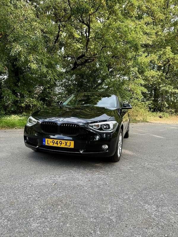 Zwart Gebruikt 2014 BMW 116 Executive Hatchback | € 10.000 (Eerlijke prijs) - Afbeelding 1/4