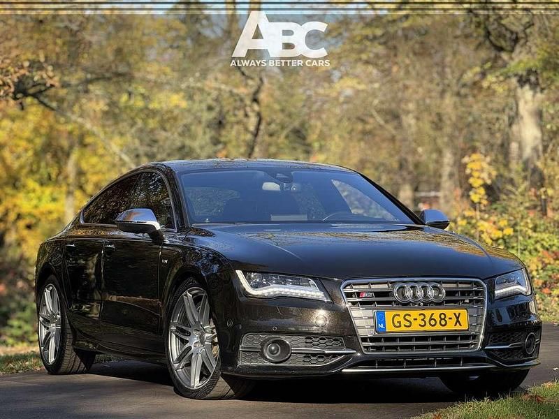 Bruin (metallic) Gebruikt 2014 Audi A7 Sportback Proline Hatchback | € 27.900 - Afbeelding 1/4