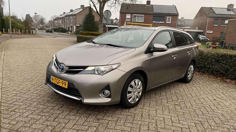 Bruin Occasion 2014 Toyota Auris Touring Sports Stationwagen | € 5.950 (Eerlijke prijs) - Afbeelding 1/4