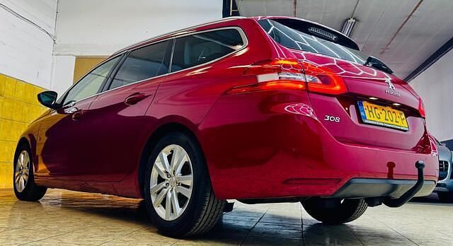 Occasion Peugeot 308 SW 110 PK (80 kW) 2015 Rood Stationwagen