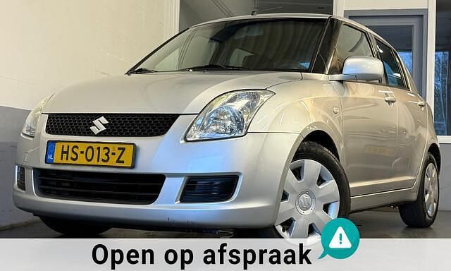 Grijs Gebruikt 2009 Suzuki Swift Comfort Hatchback | € 2.795 (Eerlijke prijs) - Afbeelding 1/4