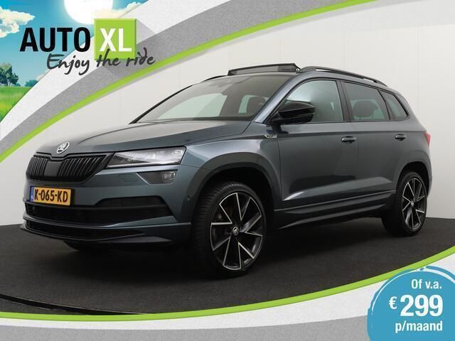 Grijs Gebruikt 2021 Skoda Karoq SportLine SUV | € 25.940 (Eerlijke prijs) - Afbeelding 1/4