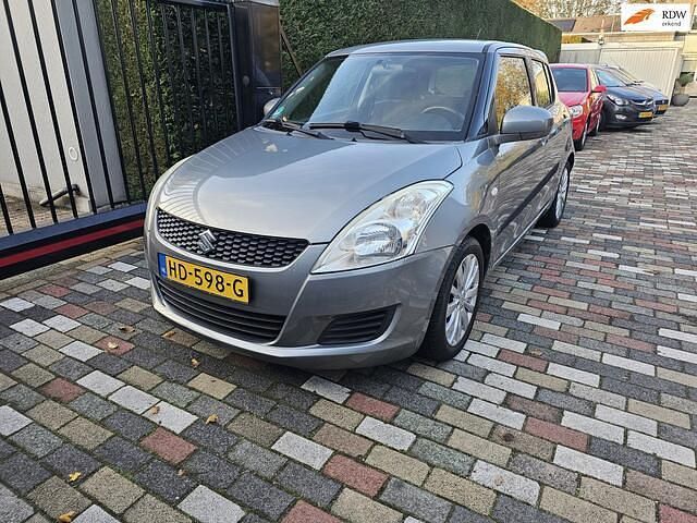 Grijs Gebruikt 2011 Suzuki Swift Hatchback | € 4.950 (Eerlijke prijs) - Afbeelding 1/4
